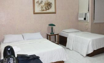 Plaza Maria Luisa Suites Inn