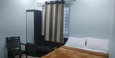 Iroomz Hotel Partha Grand Hotels near STBC Grounds