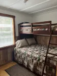 A stylish Adirondack Log Cabin located along side the NYS Hiking trail System!!
