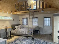 Modernized, renovated, cozy cottage steps away from a private beach.