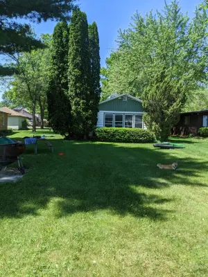 Classic Green Lake cottage, lakefront, screened boathouse deck, dock, swimming