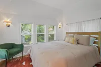 Stylish West Plaza Retreat w/ Huge Yard, BBQ, and Games Hotels near Fine Stitch LLC