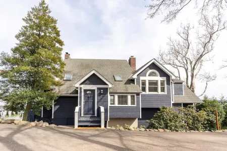 River front with large decks and dock over the Hudson