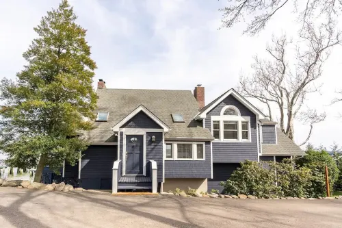 River front with large decks and dock over the Hudson