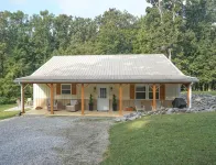 Spacious Home in Moors Community on KY Lake with Outdoor Hot Tub and Fire Pit