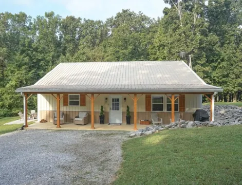 Spacious Home in Moors Community on KY Lake with Outdoor Hot Tub and Fire Pit