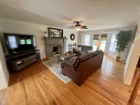 BACKYARD OASIS! Cozy and charming 60s Brick ranch with relaxing gazebo over pond