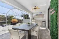 Deluxe 4BD/3BH Waterfront Home with Heated Pool and Golf Access and EV Charger