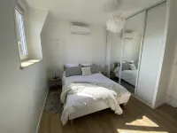 Large elegant apartment in the heart of Epernay. Quiet top floor with lovely view.