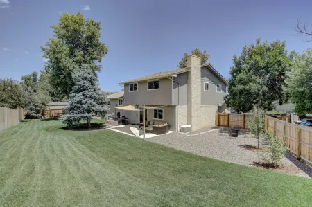 Updated home with game room, large yard, 20 min to DT Denver