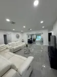 Charming 4-bedroom house with WiFi, pool, fitness room in peaceful Boynton Beach