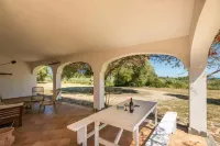 Lovely cottage with private wide garden near Orosei