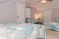 Newly Renovated, 4Bd 2 BA, 1 Full Acre, Sleeps 8, and is Pet Friendly.