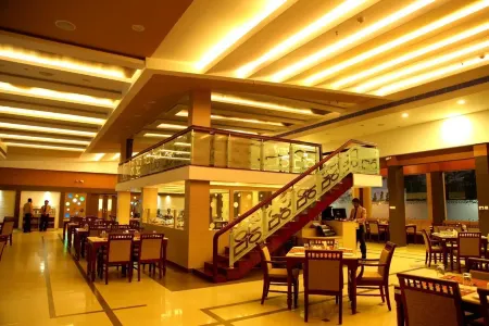 Hotel Aida Отели в г. Коттаям