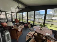 Delightful Home with Golf Cart and Enclosed Lanai - Cozy Haven