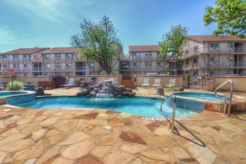 Riverfront Oasis with Two Balconies and Pools - Stunning Retreat