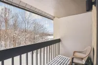 Cozy Living Room with Gas Fireplace and Balcony - Spacious Ski Retreat