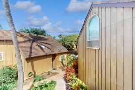 Colorful condo by the beach with a washer/dryer, lanai, & on-site pool