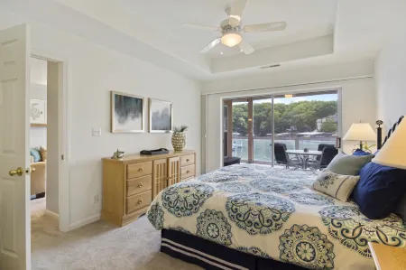 Screened Patio and Two Swimming Pools - Charming Waterfront Oasis