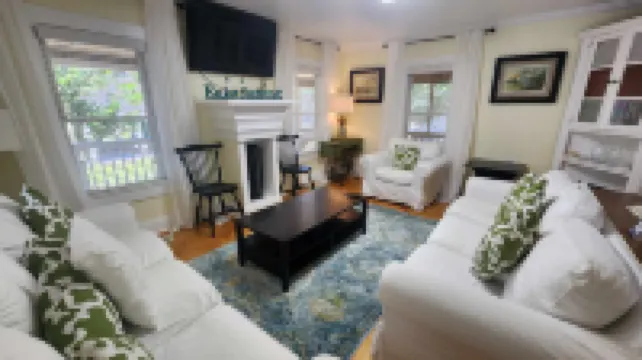 Charming Coastal Retreat with Wrap-Around Porch - Inviting Historic Haven