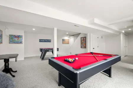 Pond Front Retreat with Game Room - Charming Escape