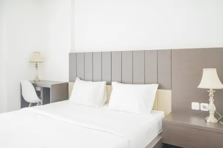 Exclusive Studio Room at Casa de Parco Apartment Отели в г. Cisauk