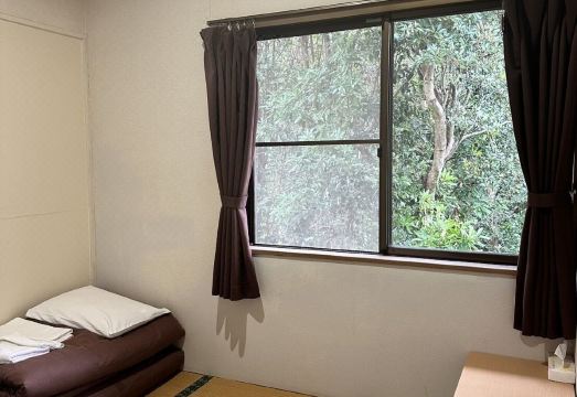 Yakushima Minsyuku Suginoko의 깔끔한 객실