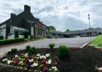 Quarters Inn & Suites Hotels near Walmart Supercenter