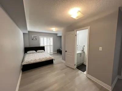One bedroom ensuite toilet on main level & kitchen, living, bathroom lower level
