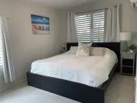 Malecon Beach House with beautiful backyard. Steps from the Caribbean ocean.