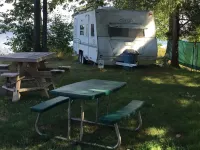 Get lulled to sleep by Lake Superior in Vintage camper 5 steps from the water