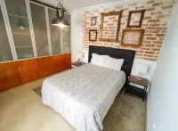 Brick wall old photographer patio house in Belem Hotels near Chafariz do Largo da Paz