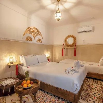 Riad les Orangers du Désert Отели рядом с достопримечательностью «Мечеть Аль-Кутубия»