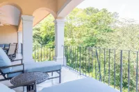 High-Ceiling Condo Nestled in Treetops at Los Sueños