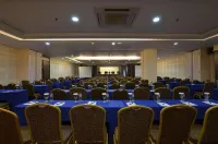 Modern Studio Grand Serpong Apartment by Travelio