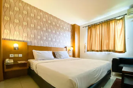 Urbanview Hotel Cosmo Jambi Отели в г. Talang Bakung