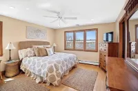 Waterfront Home with Spacious Deck and 4 Bedrooms Hotels near Sand 'n' Surf Wicker & Gifts