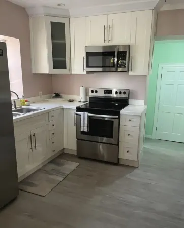 Pepper Town Villa is a 2 bedroom 2.5 bed villa with a pool and of outdoor space Отели в г. Ботл Крик