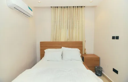 Serene 1-bedroom apartment in Abuja with AC, WiFi and 24/7 power supply Отели рядом с достопримечательностью «оз. Джаби»