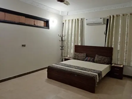 Spacious 3-bedroom apartment with WiFi, AC in charming Karachi