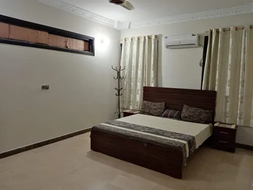 Spacious 3-bedroom apartment with WiFi, AC in charming Karachi
