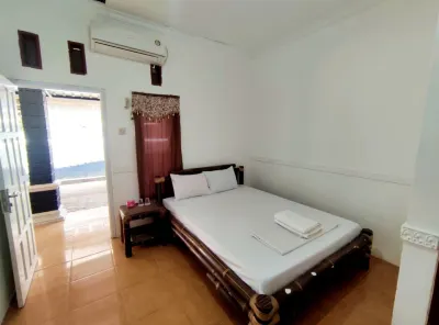 Backpacker Homestay Hotels near Pantai pulau merah
