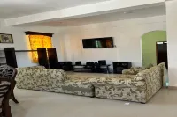 Nature view in a quiet urban neighborhood 1-bedroom house with WiFi and AC Hotels in Corozal