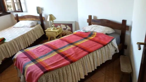 House in verdant paradise with golden lake, gated community