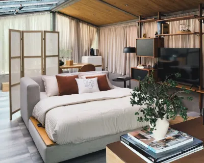 Welcome to our cozy glass studio nestled in a serene villa garden in Casablanca. Hotels in Sidi Maarouf