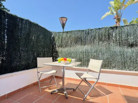 Apartamento en Primera Línea de Playa en Benalmádena Отели рядом с достопримечательностью «Памятник Коломаресу»