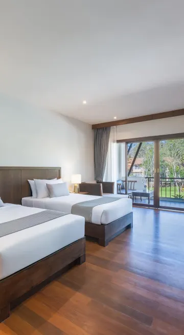 ห้องดีลักซ์ เตียงแฝด พร้อมวิวสระว่ายน้ำ