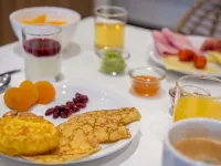 佩皮尼揚中心諾富特全套房飯店 - 早餐