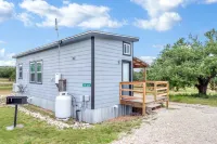 Charming Tiny House Retreat with Cozy Porch - Inviting Escape
