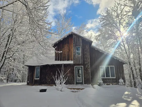 Snowmobile-Friendly Cabin Half Mile from Tri-County Corridor w/ Trailer Parking